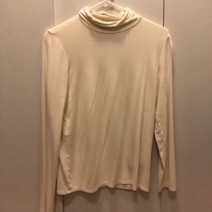 stretchy large off white turtleneck never worn